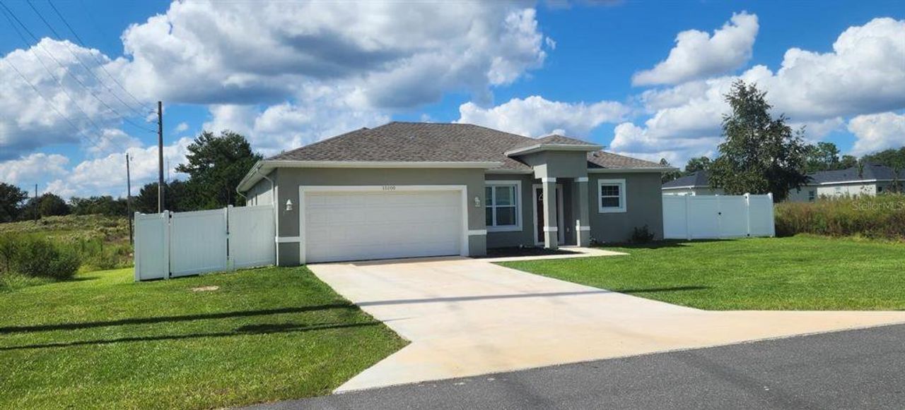Front exterior of a new home in , Ocala, FL, highlighting curb appeal (Image 2).