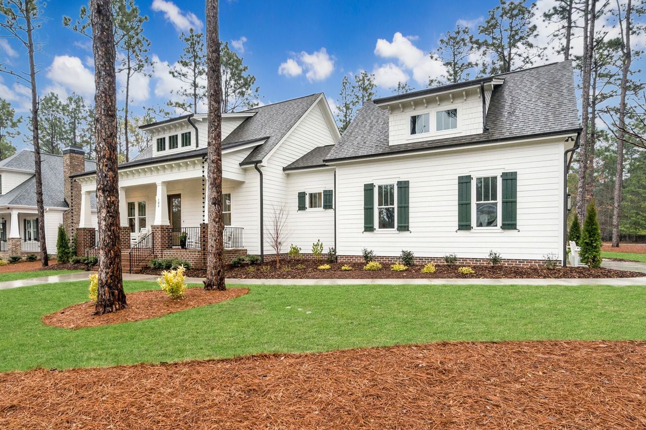 Exterior details and patio area of a home in Hollycrest, Pinehurst (Image 2).