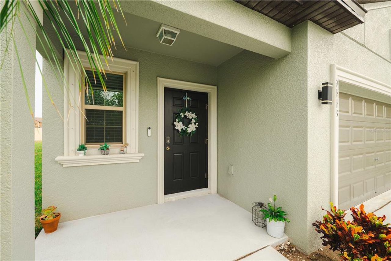 Front exterior of a new home in , Sun City Center, FL, highlighting curb appeal (Image 2). Front exterior of a new home in , Sun City Center, FL, highlighting curb appeal (Image 2).