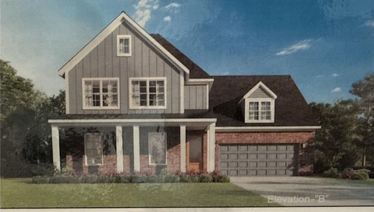 Front exterior of a new home in White Oak, Arlington, TN, highlighting curb appeal (Image 2). Front exterior of a new home in White Oak, Arlington, TN, highlighting curb appeal (Image 2).