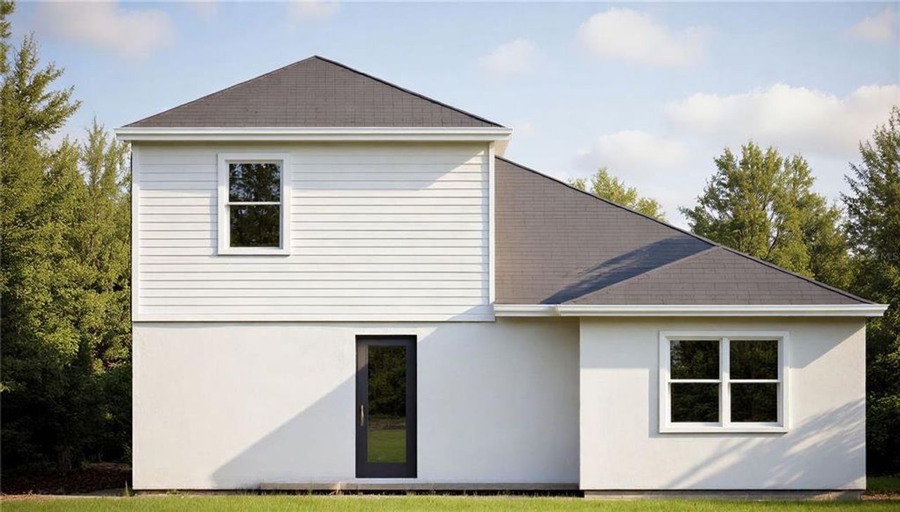 Front exterior of a new home in , Orlando, FL, highlighting curb appeal (Image 2).