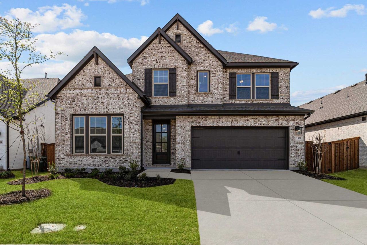 Representative exterior photo of a completed home built from the The Brays by David Weekley Homes in Mantua Point Classics, Van Alstyne, TX (Image 2).