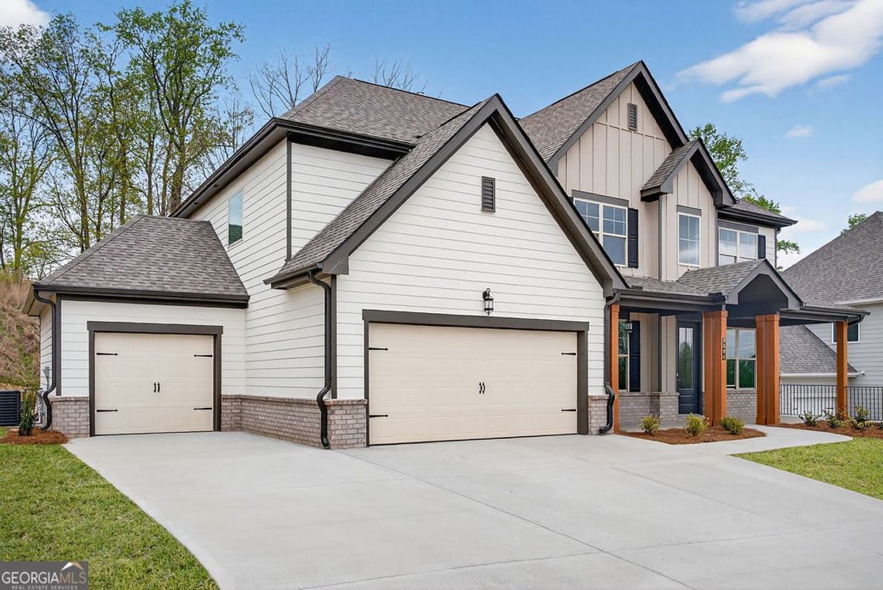 Front exterior of a new home in The Manor at Gainesville Township, Gainesville, GA, highlighting curb appeal (Image 2).