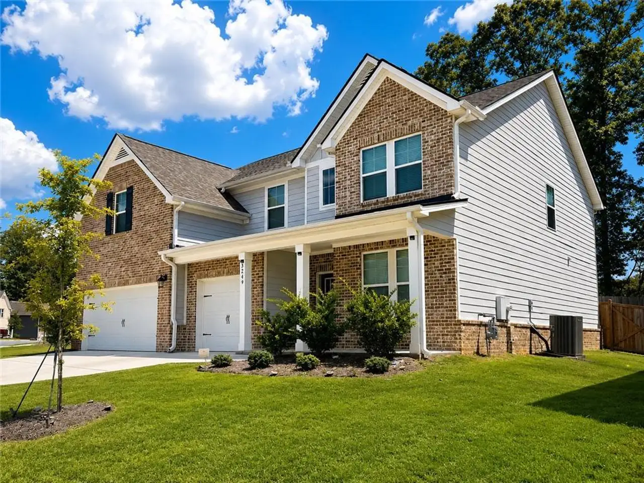 Front exterior of a new home in Twin Shoals, Atlanta, GA, highlighting curb appeal (Image 2).