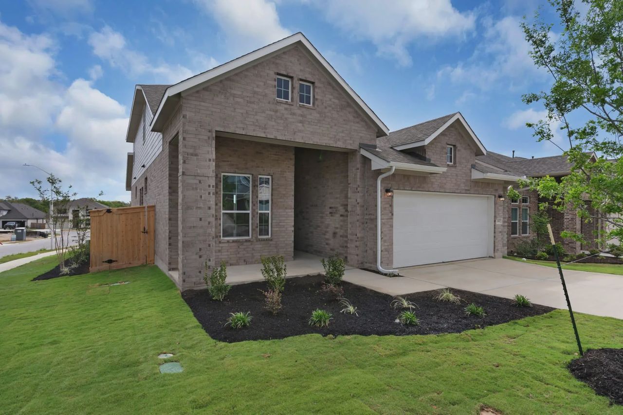Representative exterior photo of a completed home built from the Lucas by Chesmar Homes in Santa Rita Ranch, Liberty Hill, TX (Image 2).