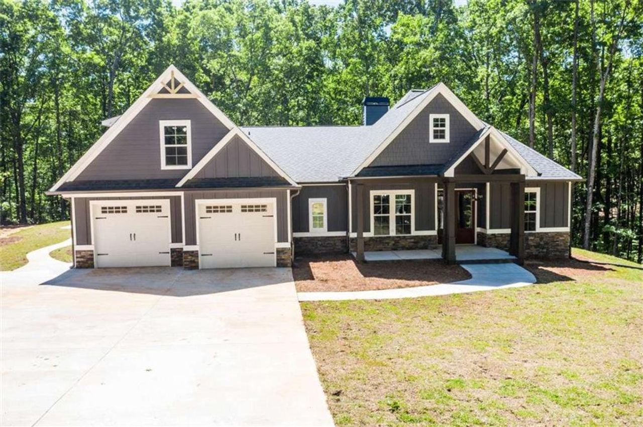 Front exterior of a new home in , Carrollton, GA, highlighting curb appeal (Image 2).