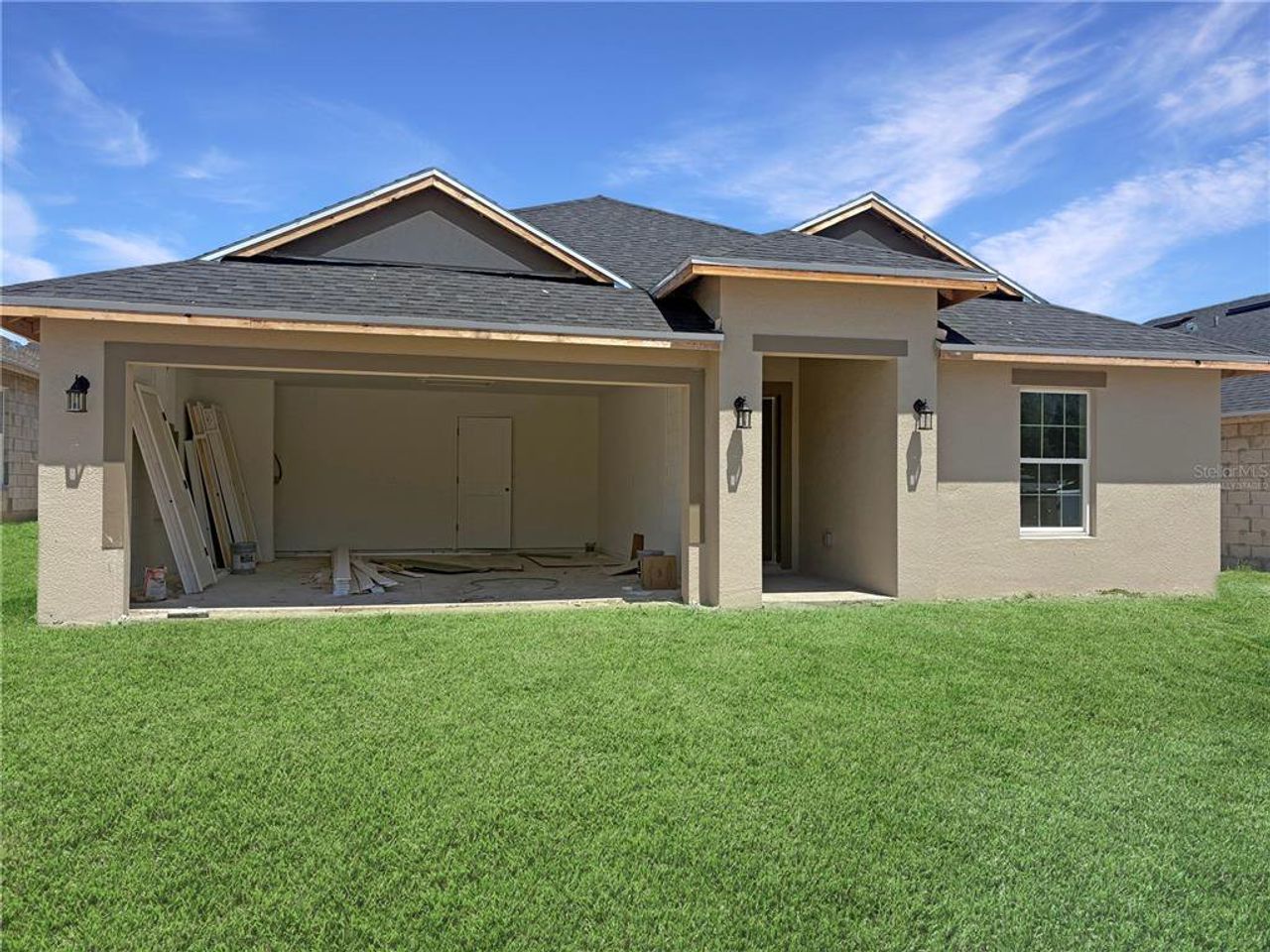 Exterior details and patio area of a home in Arbor Park, Leesburg (Image 2).