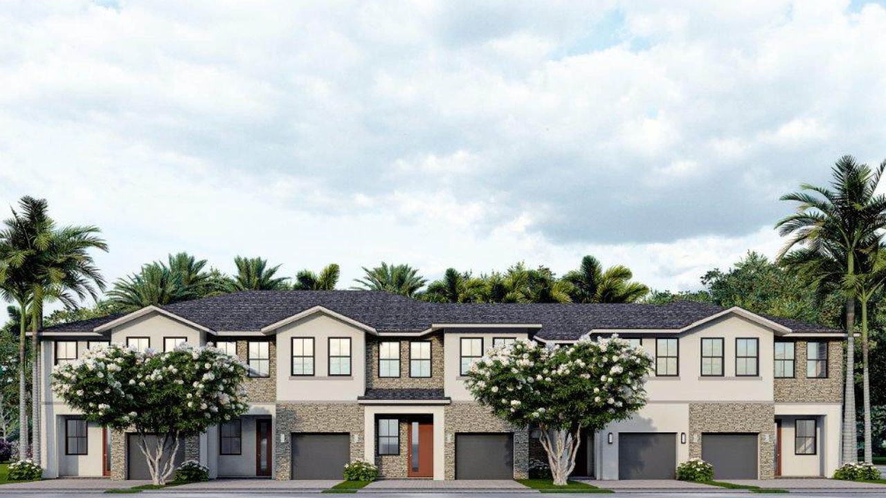 Front exterior of a new home in Vineyards, Davie, FL, highlighting curb appeal (Image 2).