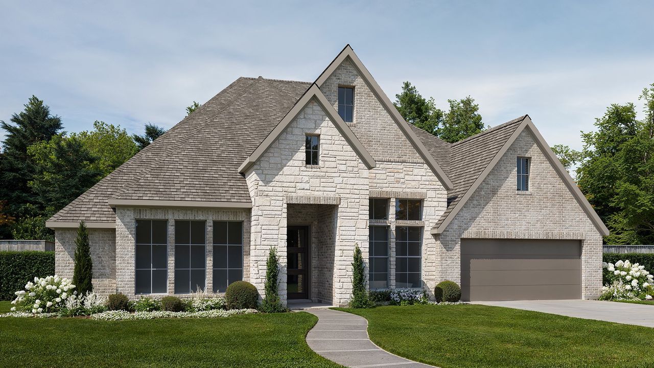 Representative exterior photo of a completed home built from the 3566P by Perry Homes in Audubon, Pinehurst, TX (Image 2).