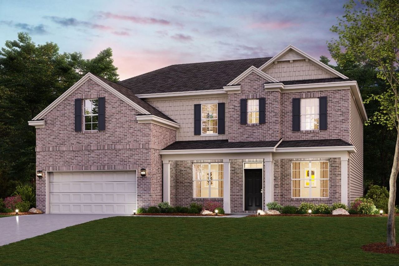 A house with a large front yard.