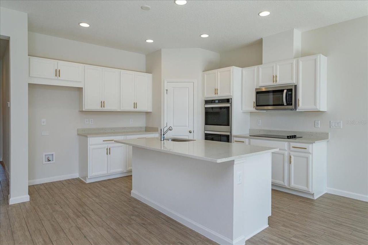 Furnished interior view inside a new home in Willowbrook North, Winter Haven (Image 2).