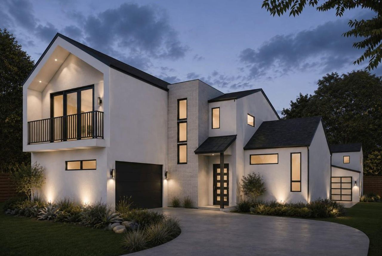 Dramatic lighting illuminates the clean lines and striking facade of this modern residence.