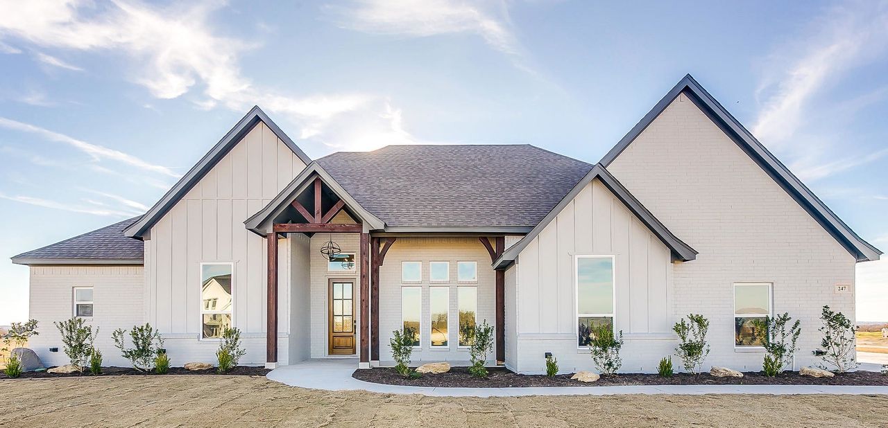 Representative exterior photo of a completed home built from the 100-2466-0718 by Abba River Homes in Stanford Estates, Springtown, TX (Image 2).