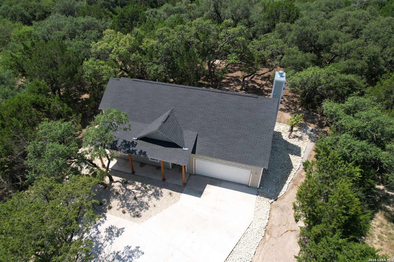 Front exterior of a new home in , Lakehills, TX, highlighting curb appeal (Image 2).