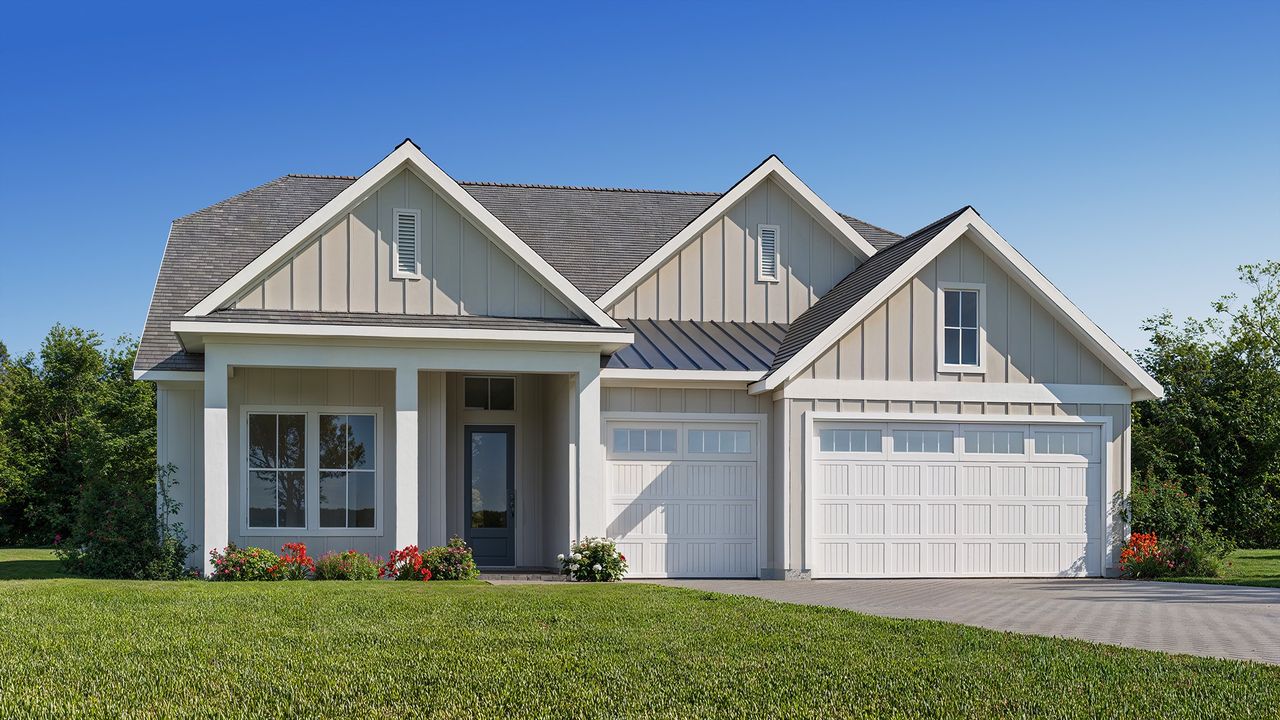 Representative exterior photo of a completed home built from the 2495MC by MasterCraft Builder Group in SilverLeaf, St. Augustine, FL (Image 2).