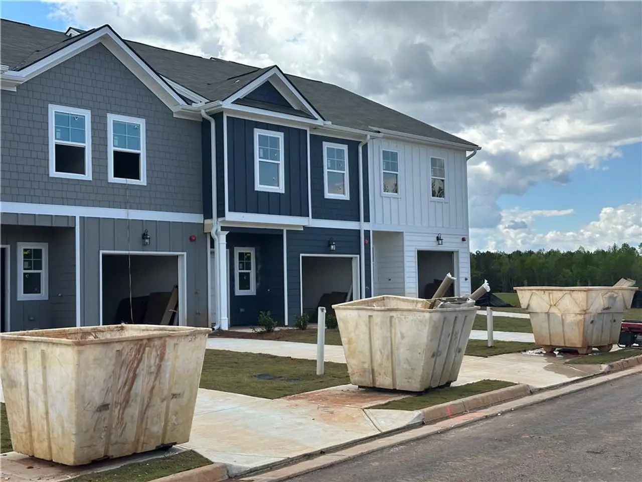 Front exterior of a new home in Walden Park – The Collection, Jonesboro, GA, highlighting curb appeal (Image 2). Front exterior of a new home in Walden Park – The Collection, Jonesboro, GA, highlighting curb appeal (Image 2).