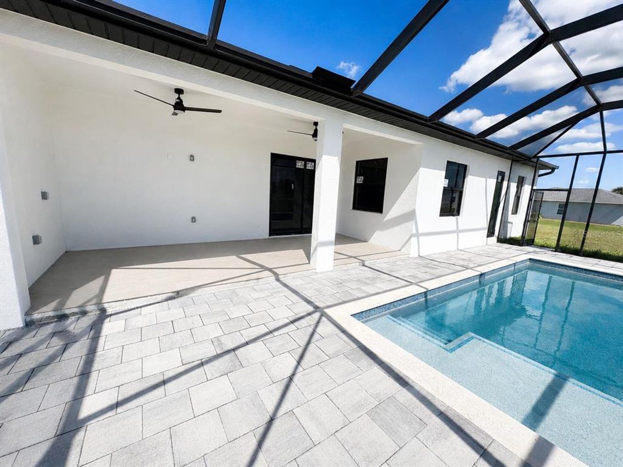 Exterior details and patio area of a home in , Cape Coral (Image 2).
