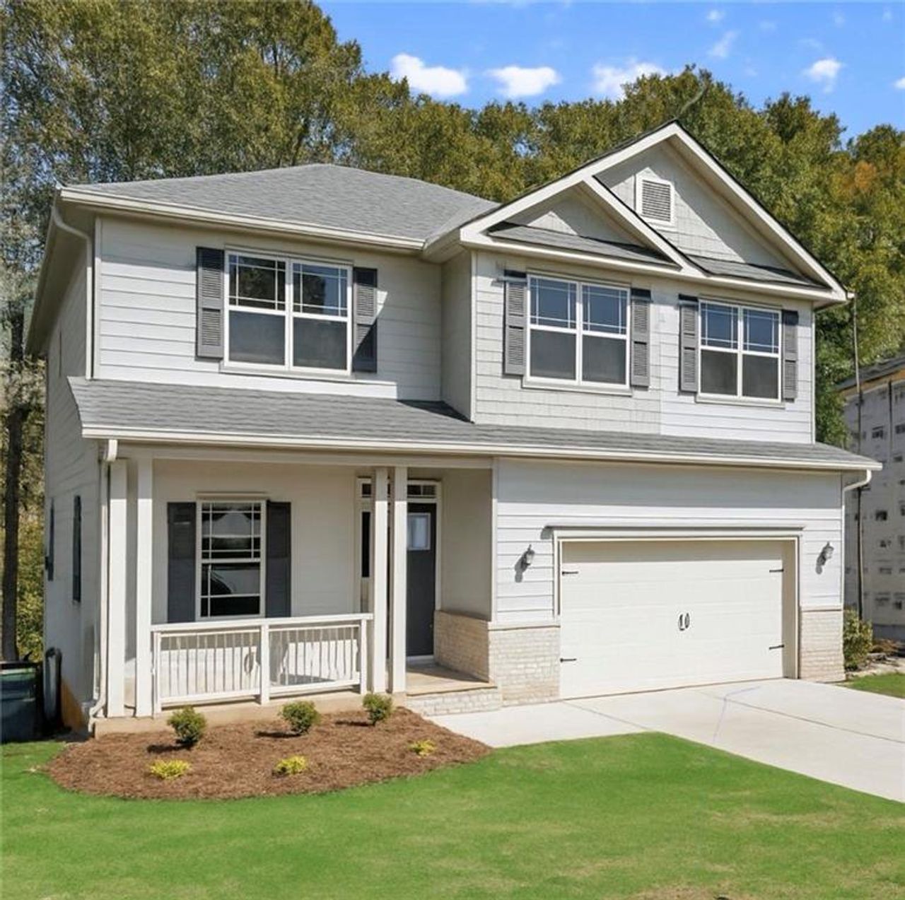 Front exterior of a new home in Habersham Meadows, Demorest, GA, highlighting curb appeal (Image 2).