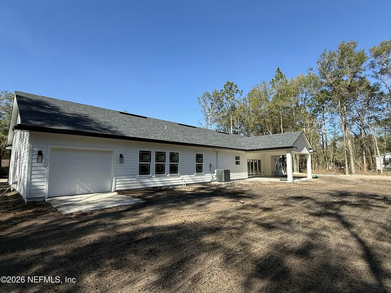 Exterior details and patio area of a home in , Middleburg (Image 2).