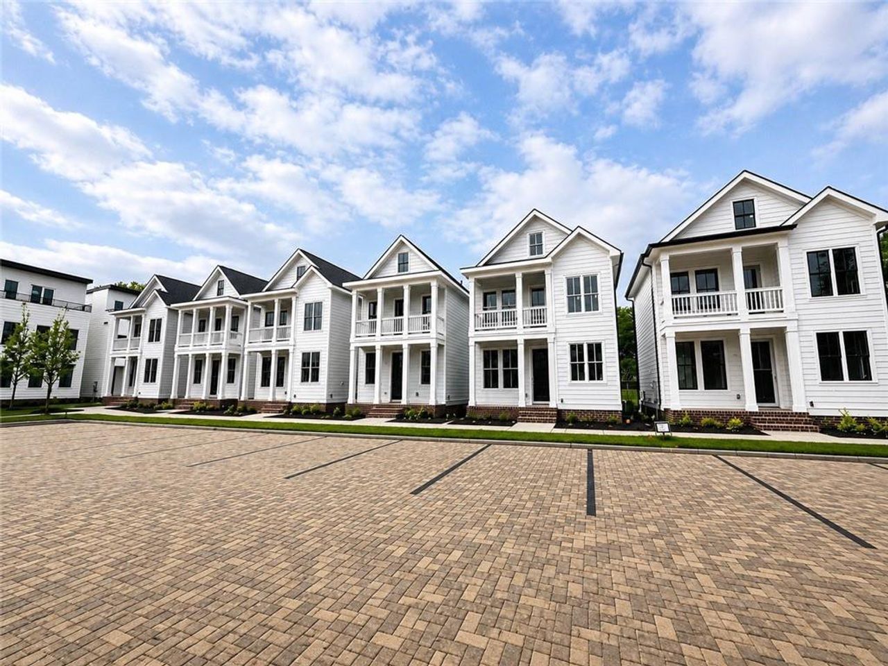 Front exterior of a new home in , Gainesville, GA, highlighting curb appeal (Image 2).