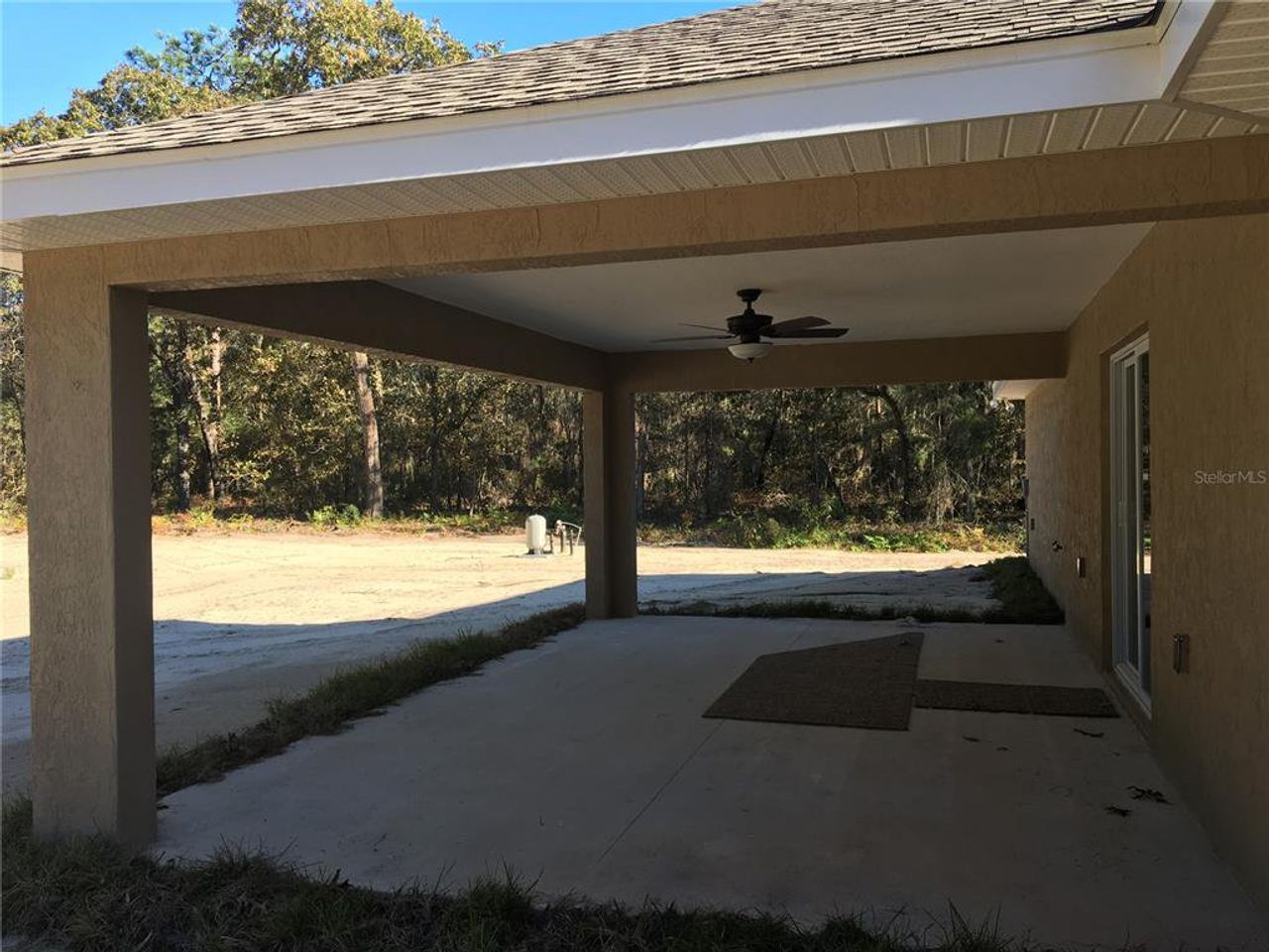 Front exterior of a new home in , Dunnellon, FL, highlighting curb appeal (Image 2).