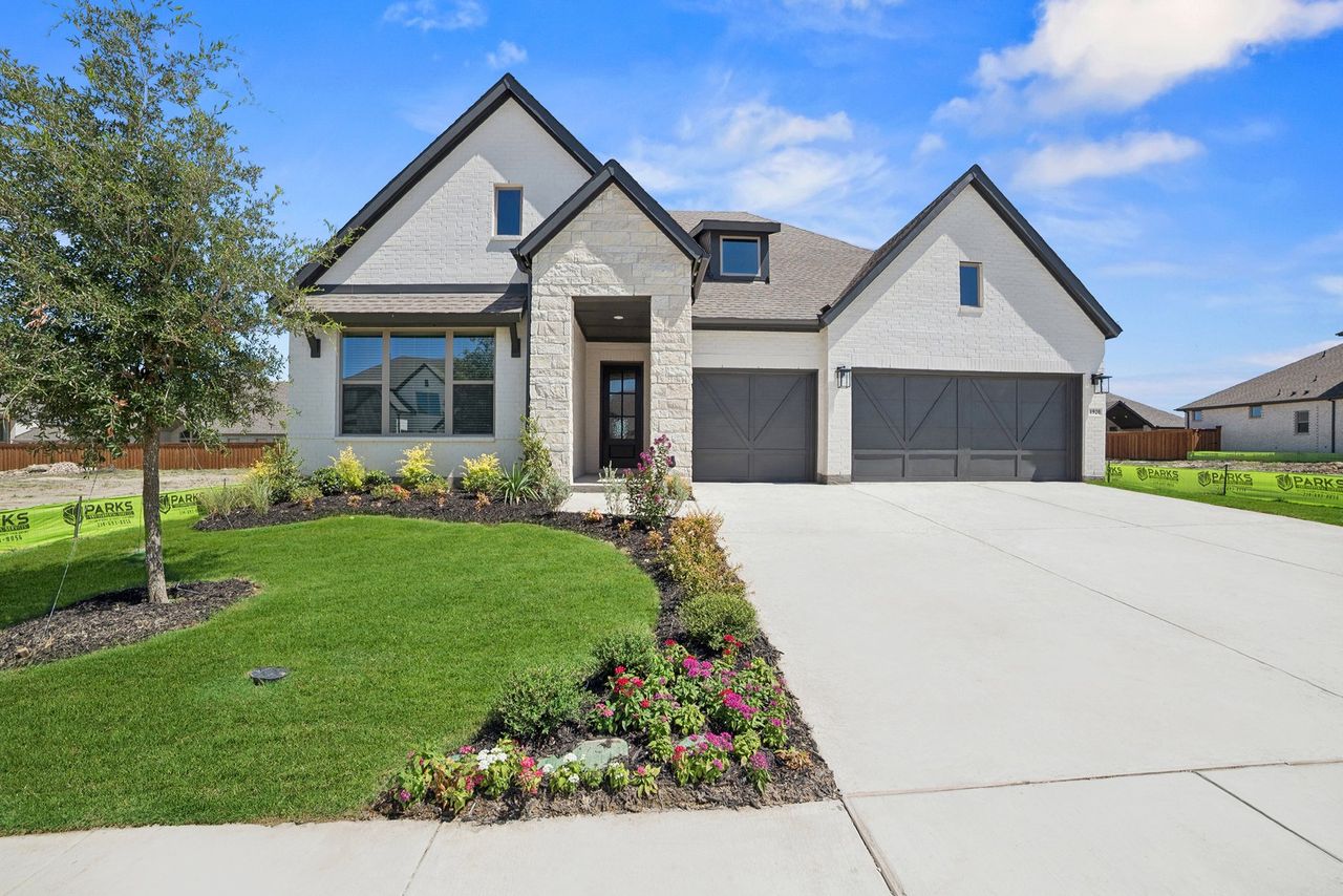 Representative exterior photo of a completed home built from the The Brenwood by David Weekley Homes in Pecan Square – Classics, Northlake, TX (Image 2).