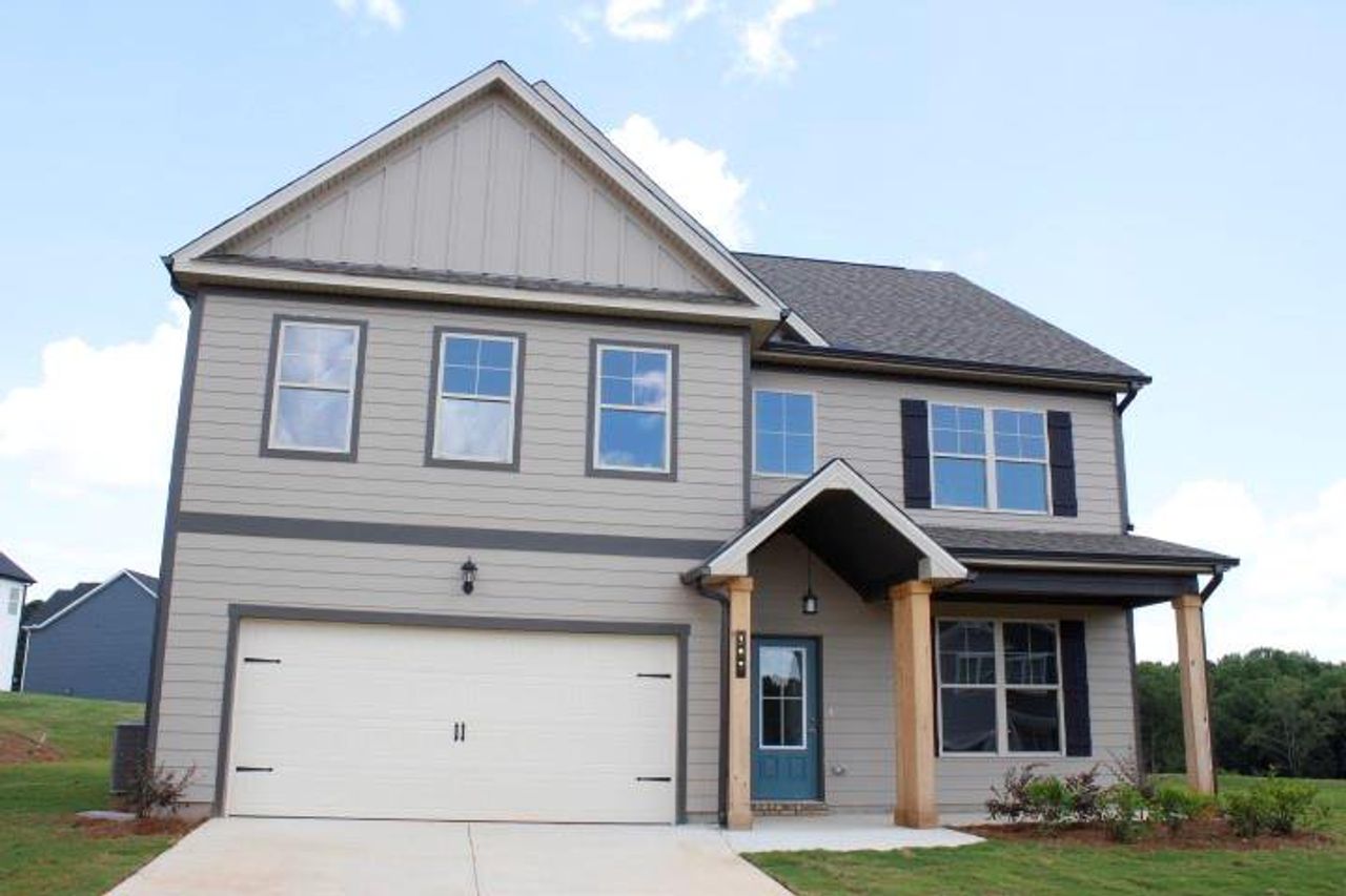 Front exterior of a new home in , Commerce, GA, highlighting curb appeal (Image 2). Front exterior of a new home in , Commerce, GA, highlighting curb appeal (Image 2).