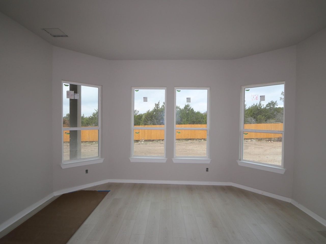 Spacious, unfurnished interior of a new home in Heritage, Dripping Springs (Image 2).