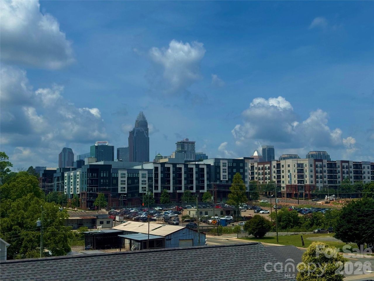 Condo located in Charlotte, NC showcasing its design and architecture (Image 2).