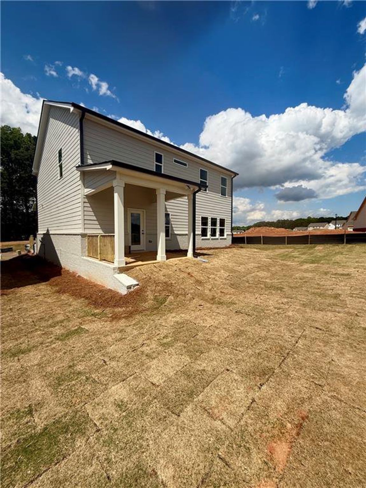 Exterior details and patio area of a home in Fowler Farms, Auburn (Image 2).