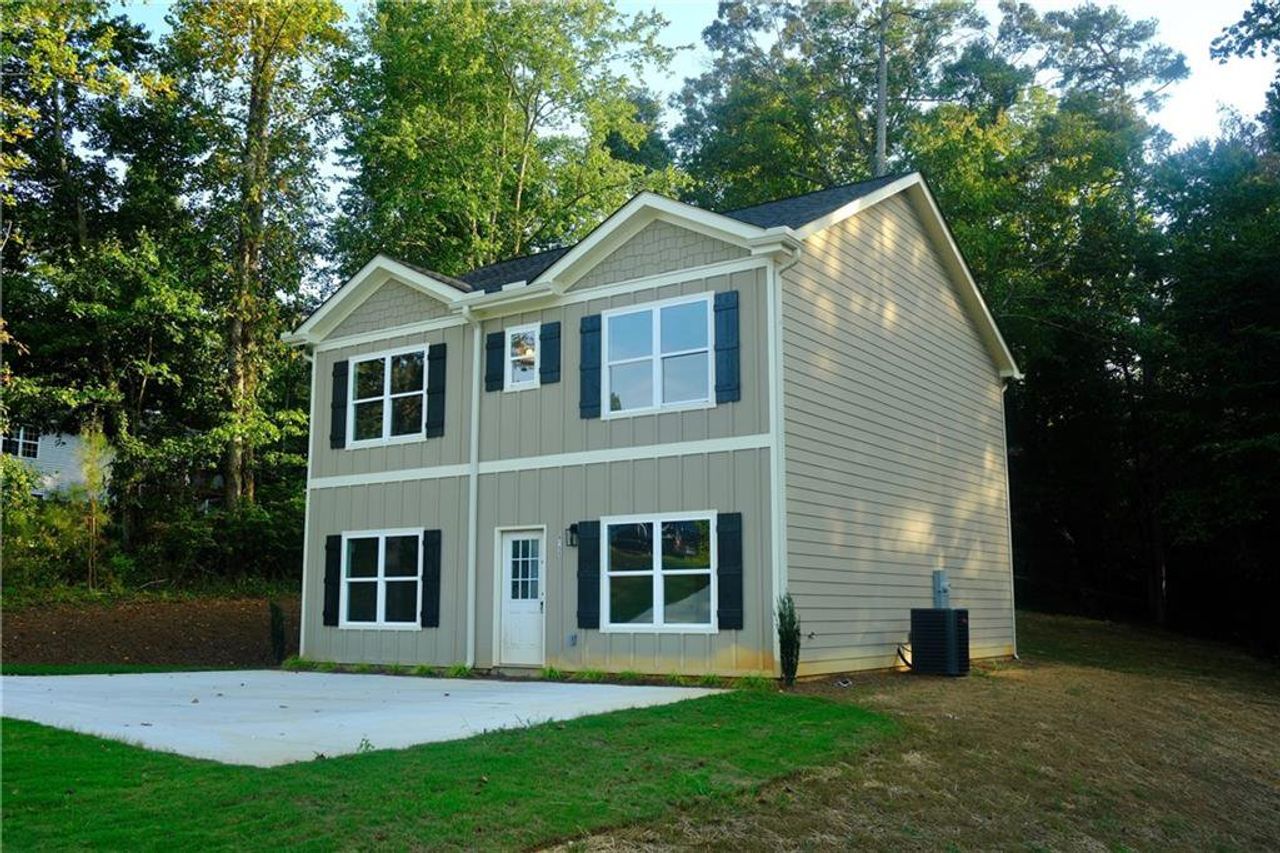 Front exterior of a new home in , Gainesville, GA, highlighting curb appeal (Image 2).