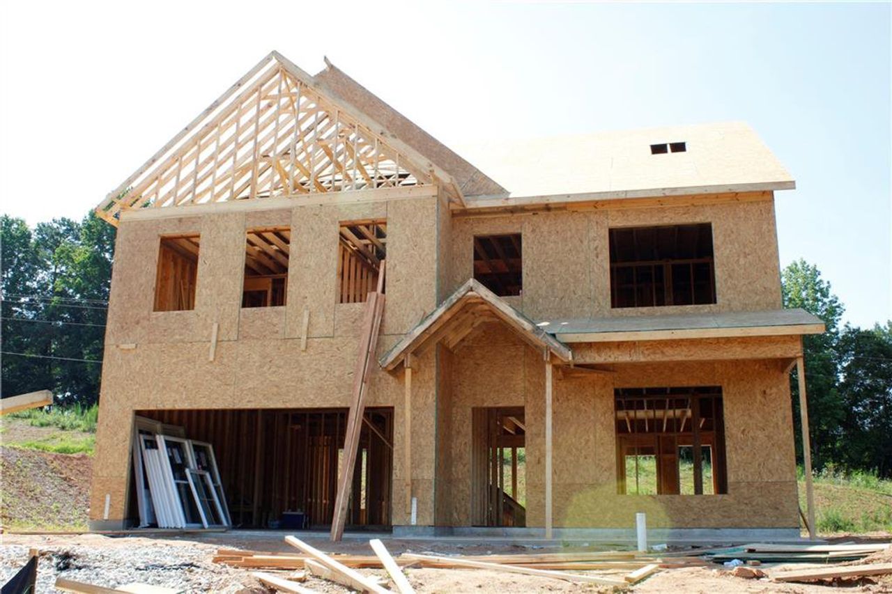 Front exterior of a new home in , Commerce, GA, highlighting curb appeal (Image 2).