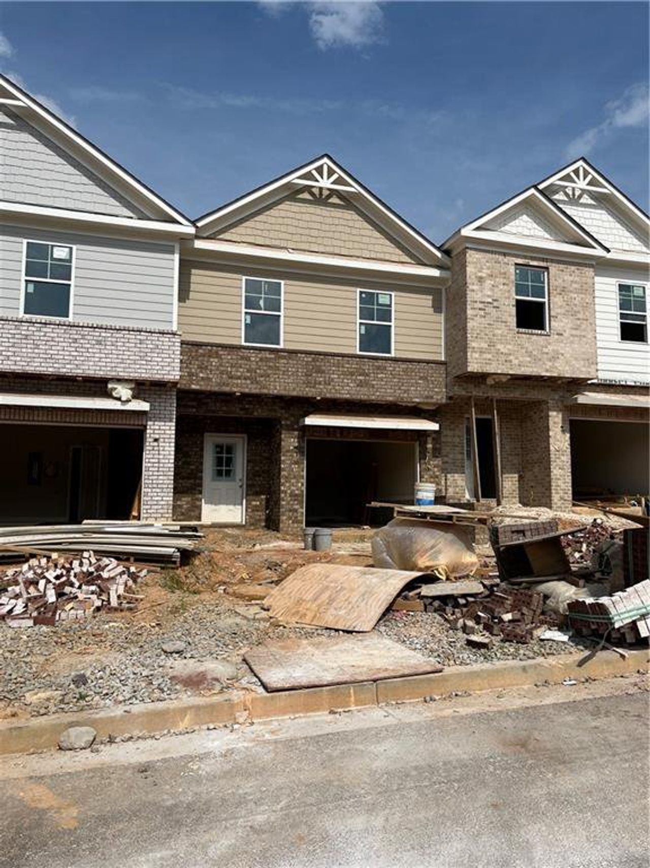 Front exterior of a new home in , Hoschton, GA, highlighting curb appeal (Image 2). Front exterior of a new home in , Hoschton, GA, highlighting curb appeal (Image 2).