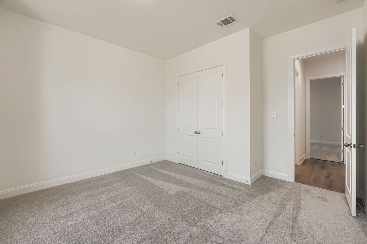 Spacious, unfurnished interior of a new home in 6 Creeks, Kyle (Image 2).