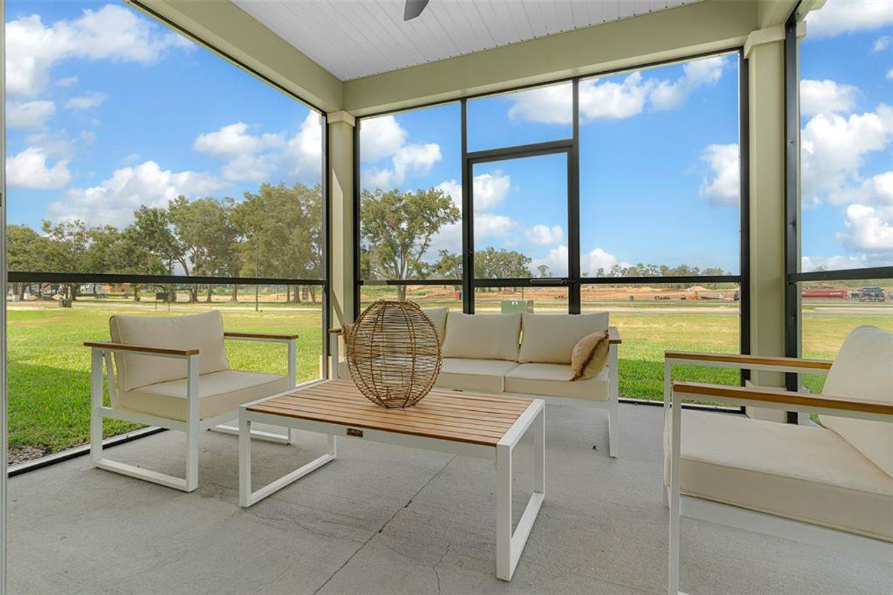 Exterior details and patio area of a home in Pioneer Ranch, Ocala (Image 2).