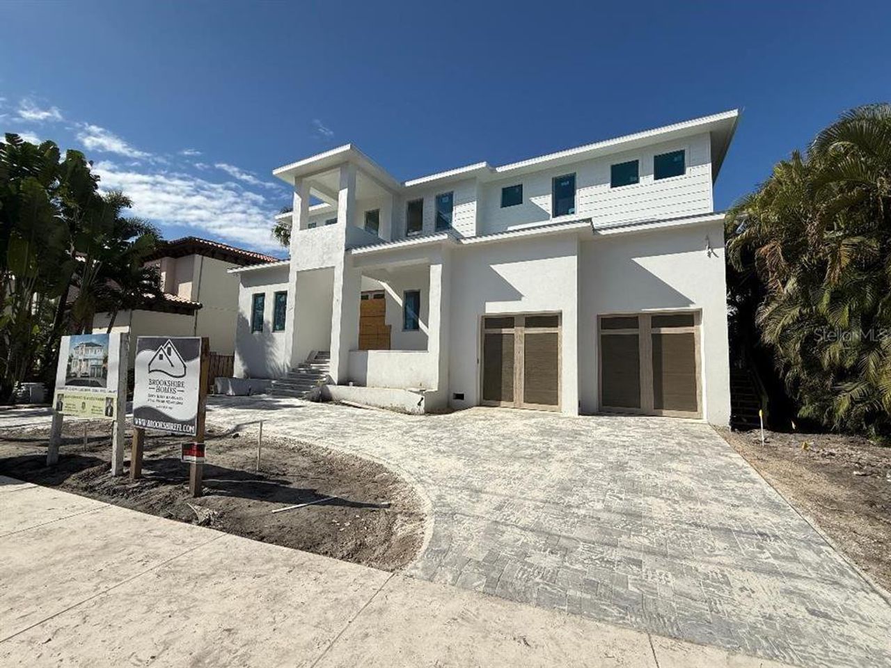 Front exterior of a new home in , Tampa, FL, highlighting curb appeal (Image 2).