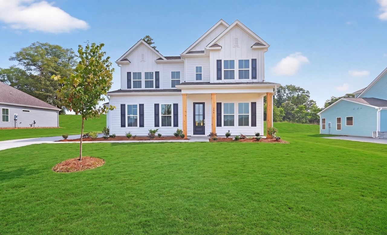 Front exterior of a new home in Braxton Ridge, Simpsonville, SC, highlighting curb appeal (Image 2).