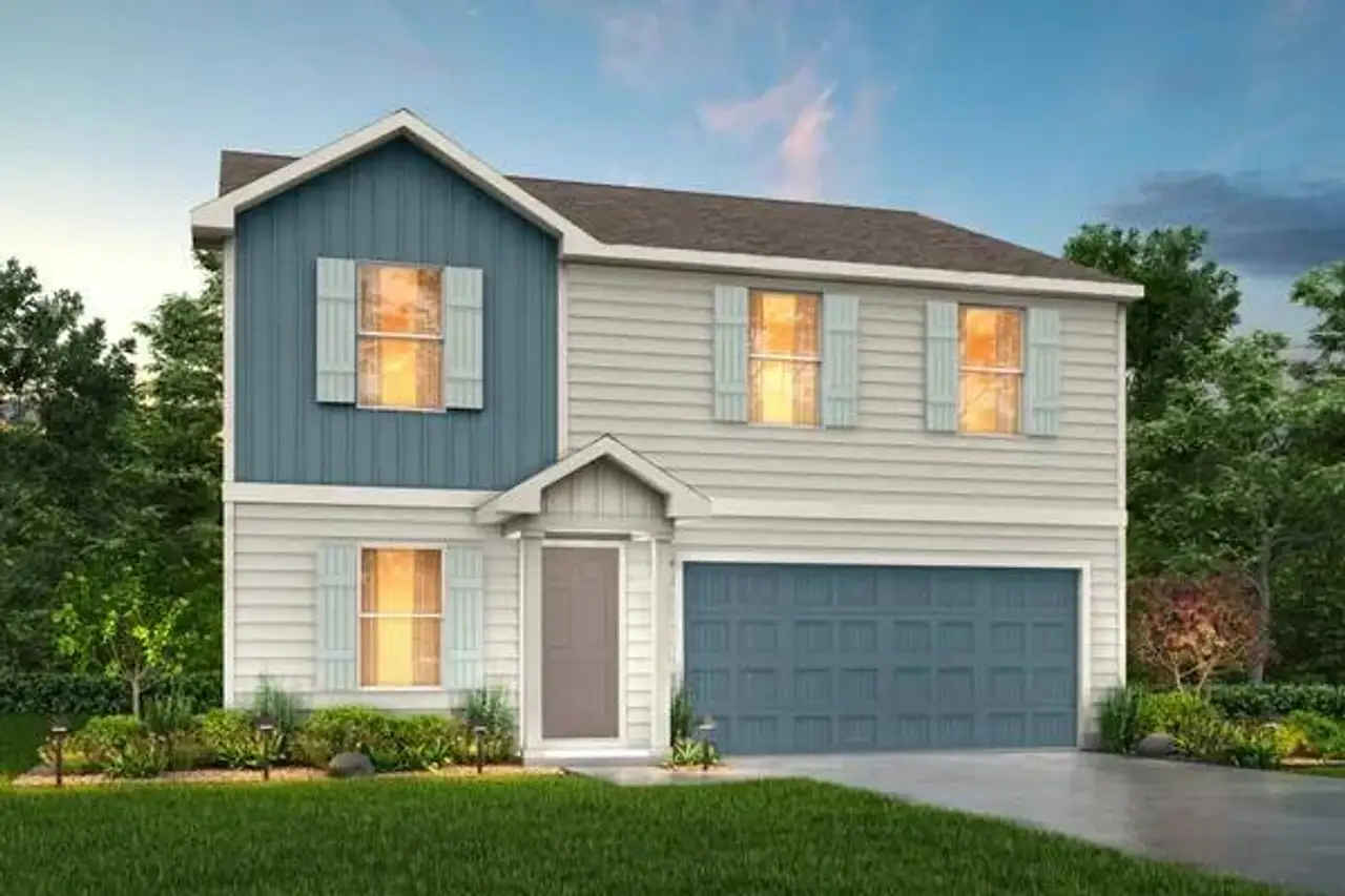 Front exterior of a new home in Thomas Estates, La Grange, TX, highlighting curb appeal (Image 2).