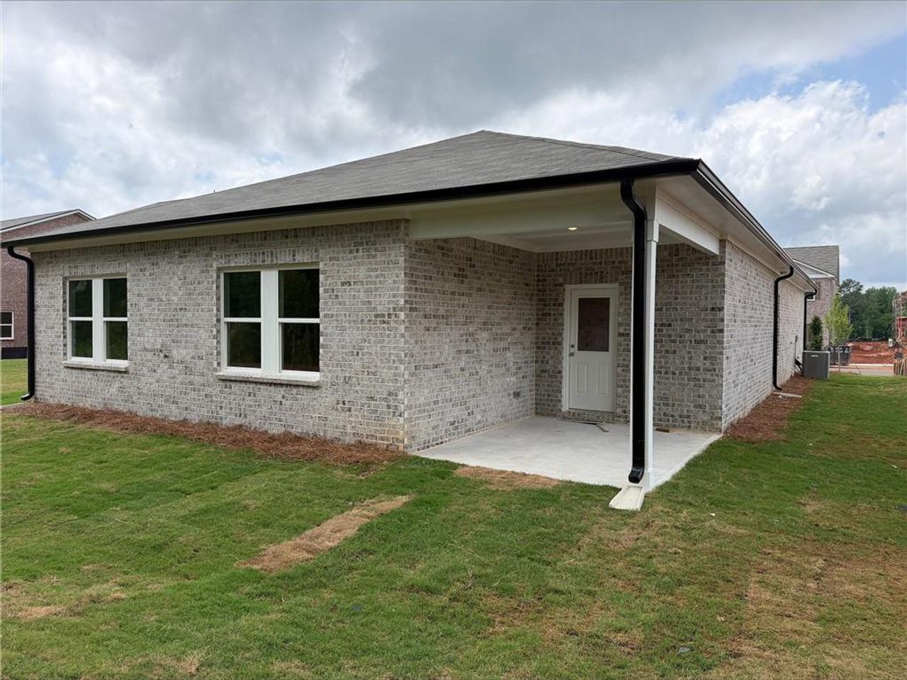 Exterior details and patio area of a home in Kendall Grove, McDonough (Image 2).