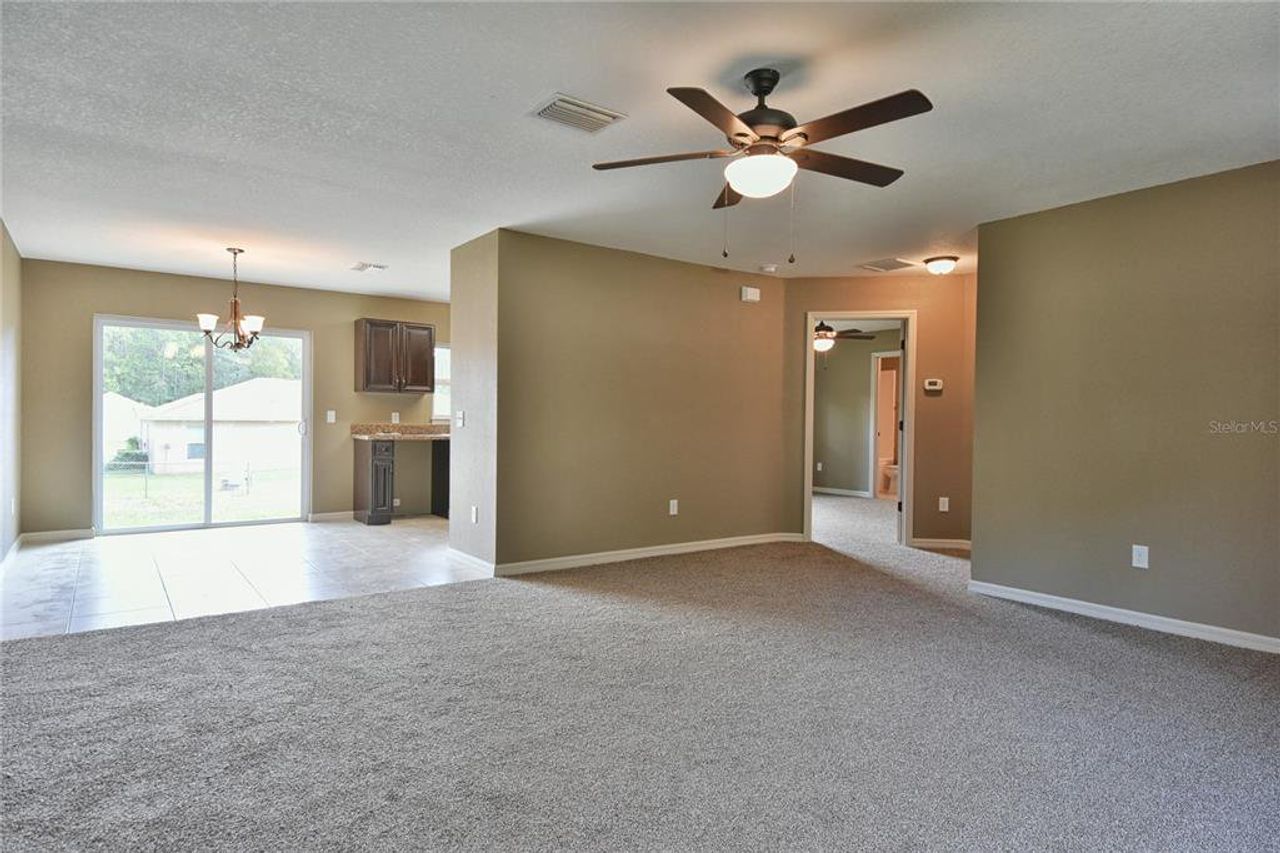 Spacious, unfurnished interior of a new home in Marion Oaks, Ocala (Image 2).