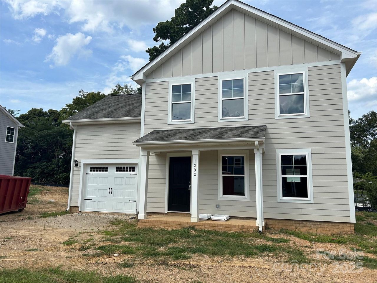 Front exterior of a new home in , Monroe, NC, highlighting curb appeal (Image 2).