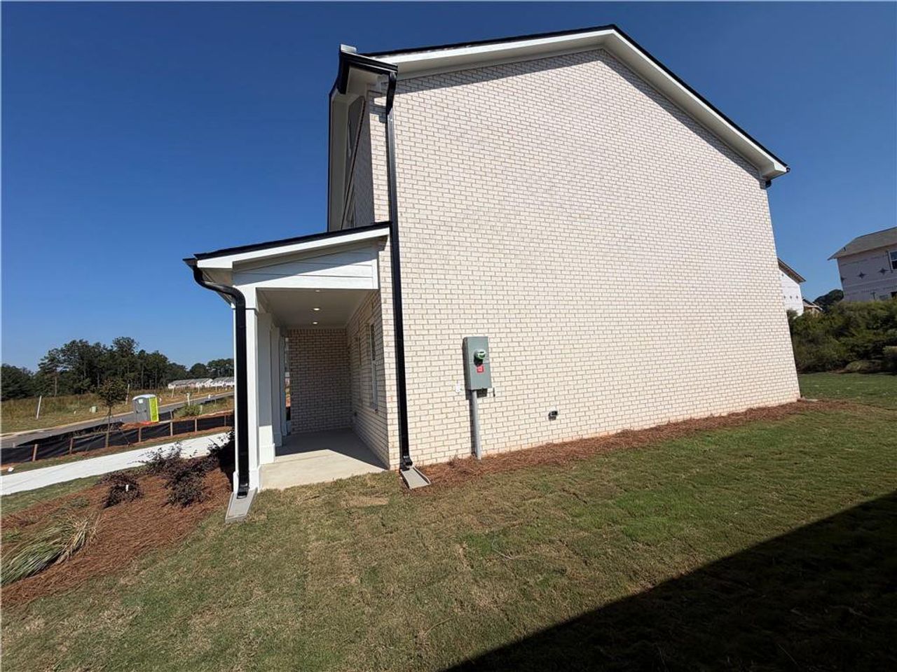 Exterior details and patio area of a home in Kendall Grove, McDonough (Image 2).