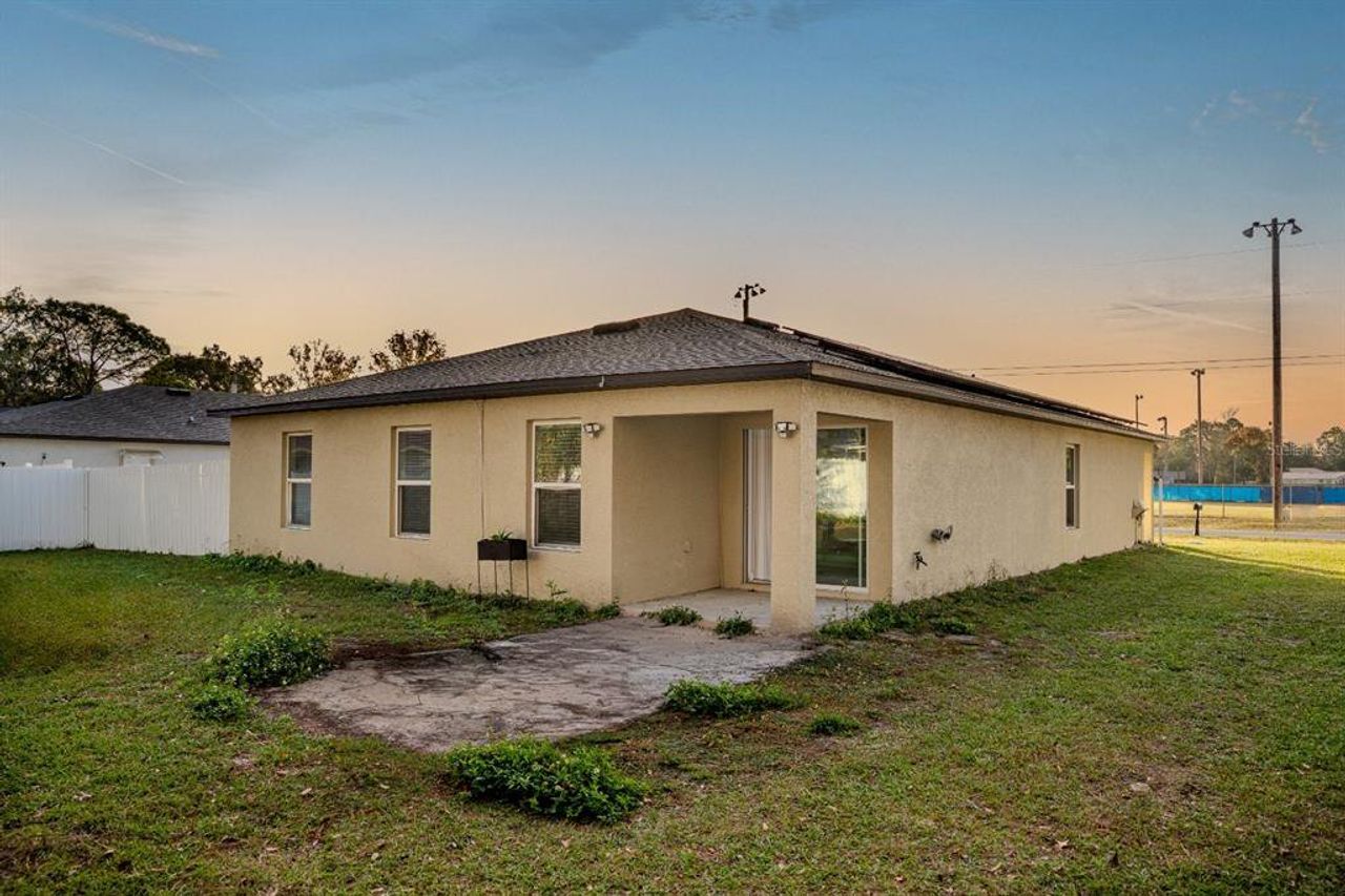 Exterior details and patio area of a home in Spring Hill Classic, Spring Hill (Image 2).
