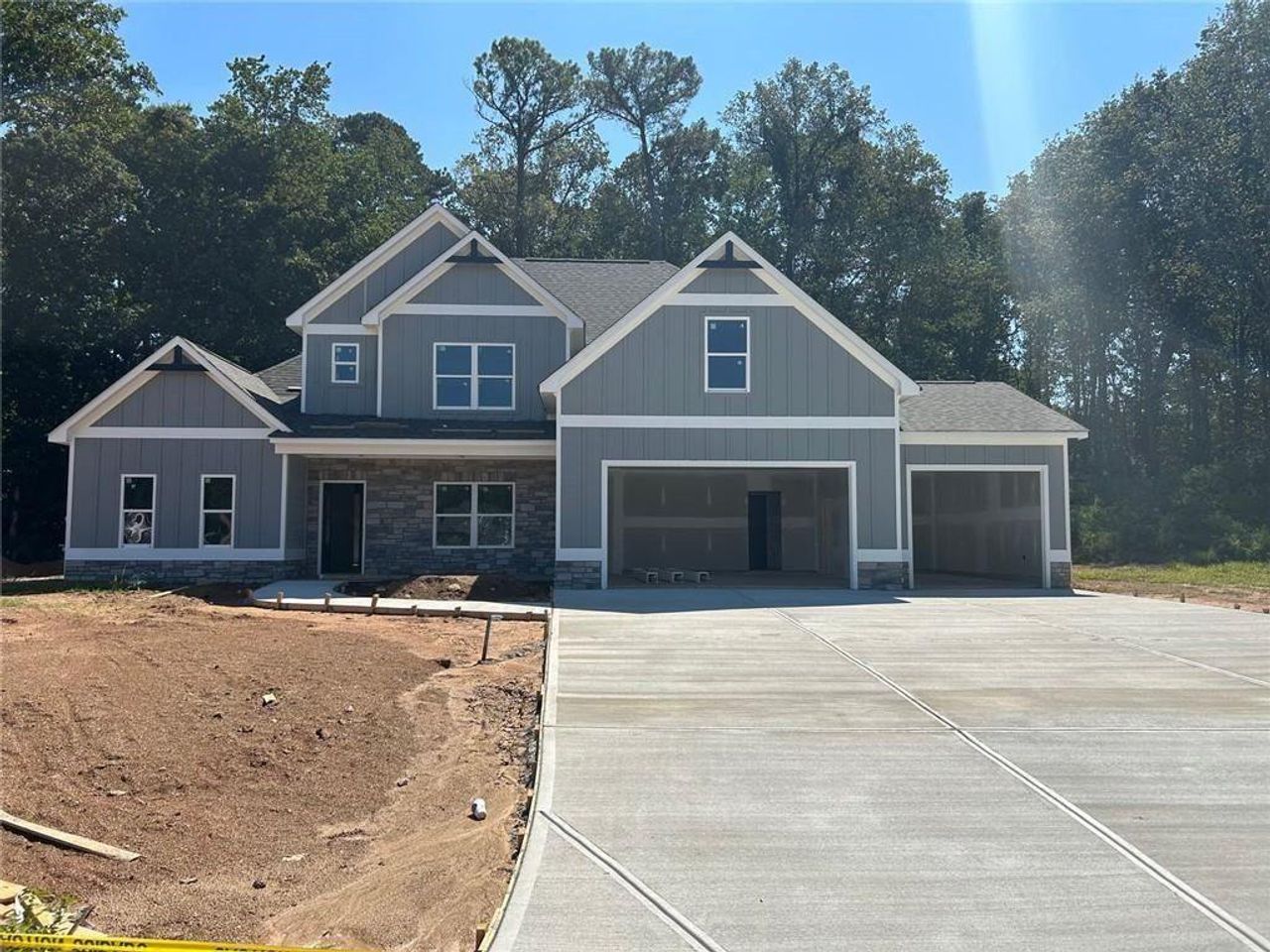 Front exterior of a new home in , Dallas, GA, highlighting curb appeal (Image 2).