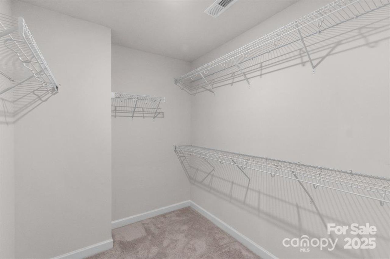 Spacious, unfurnished interior of a new home in , Albemarle (Image 2).