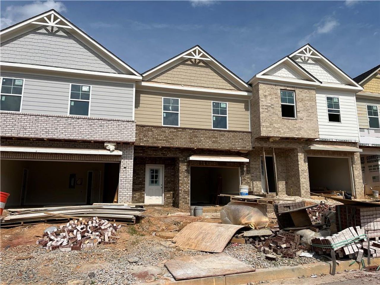 Front exterior of a new home in , Hoschton, GA, highlighting curb appeal (Image 2). Front exterior of a new home in , Hoschton, GA, highlighting curb appeal (Image 2).