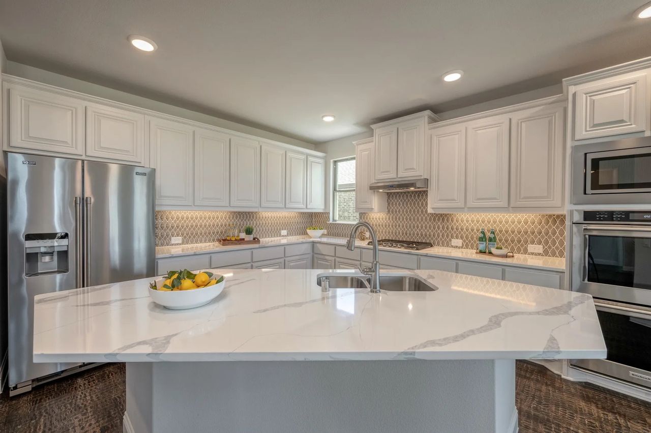 Furnished interior in a model home at Sister Grove II in Van Alstyne (Image 2).