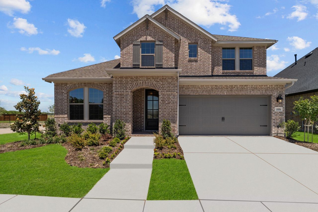 Representative exterior photo of a completed home built from the The Brays by David Weekley Homes in Sandbrock Ranch, Aubrey, TX (Image 2).