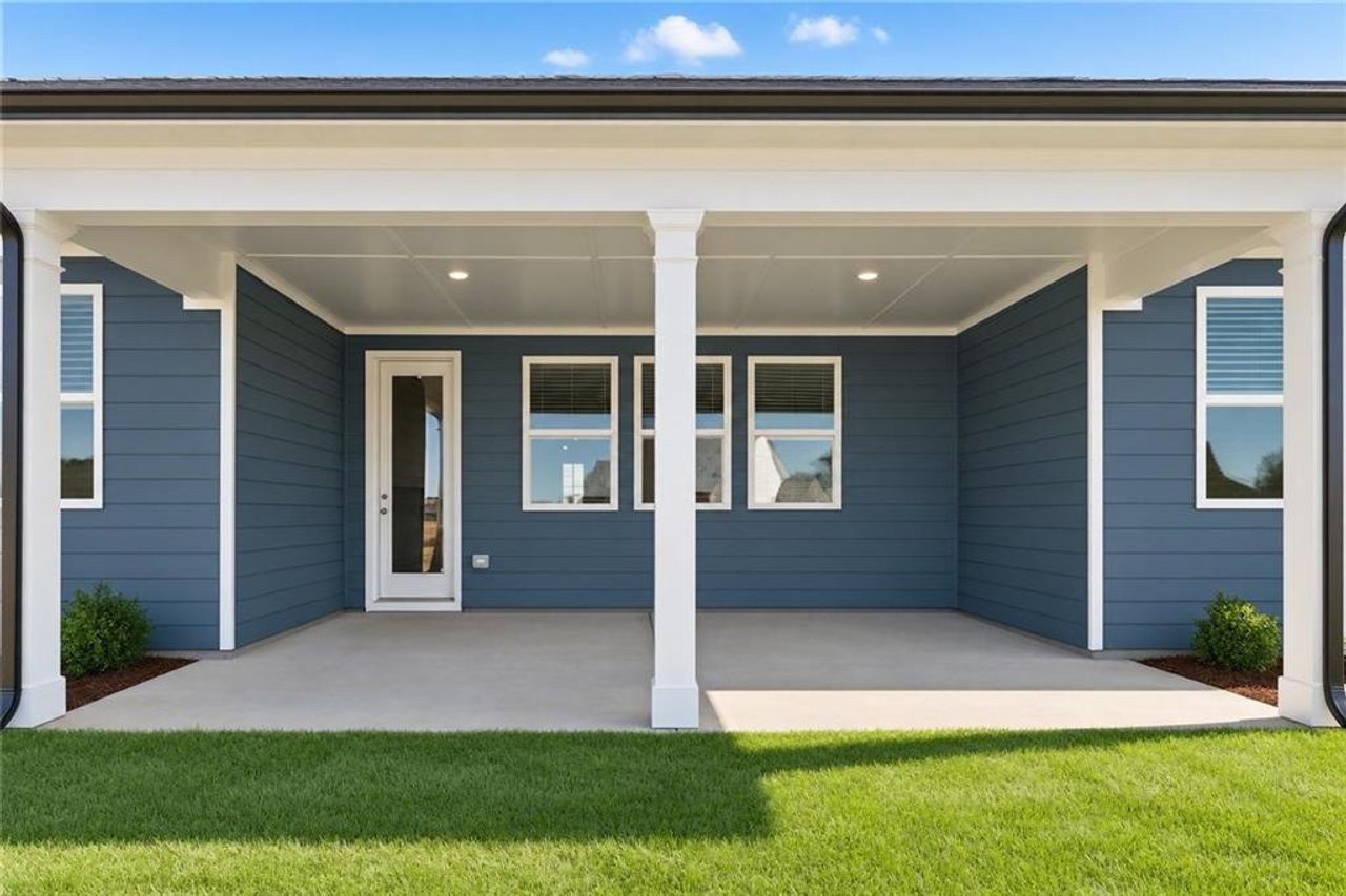 Exterior details and patio area of a home in Wehunt Meadows, Hoschton (Image 2).