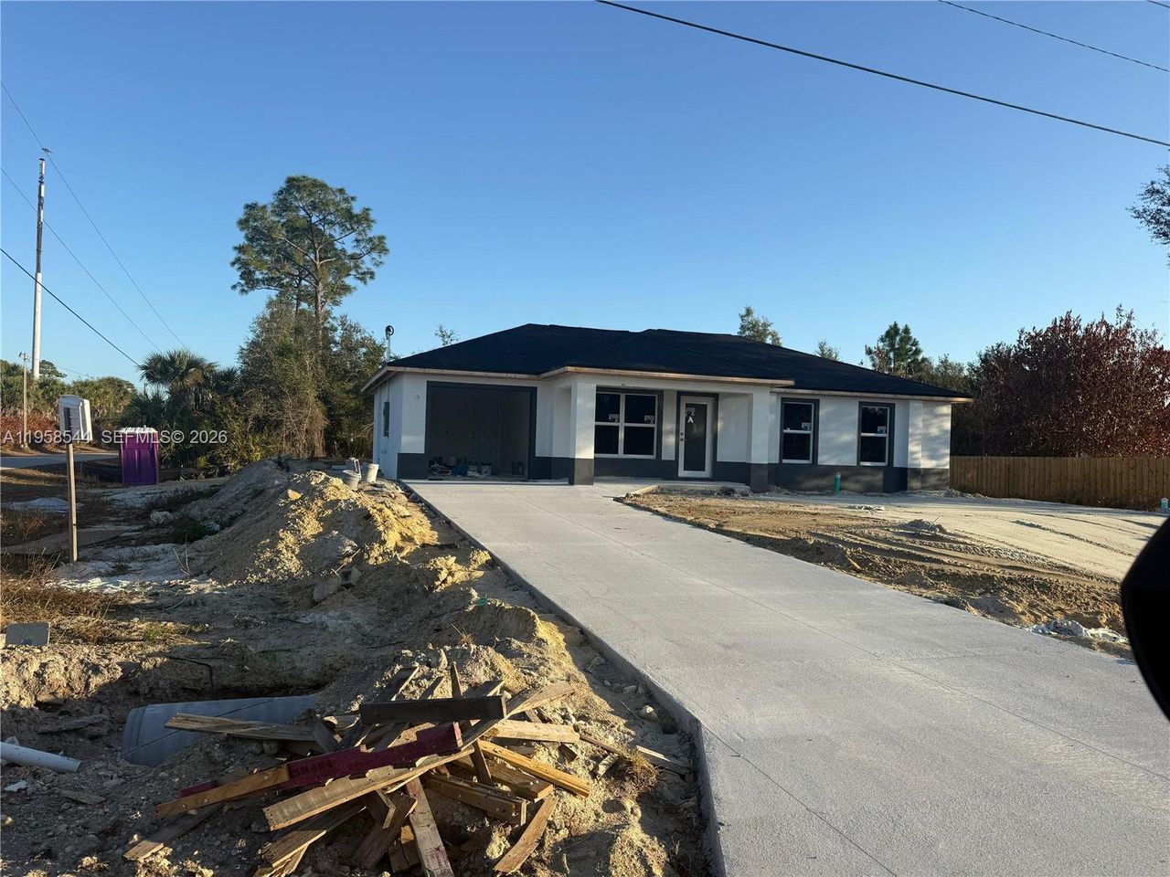 In-progress construction of a new home in , Lehigh Acres, FL (Image 2).